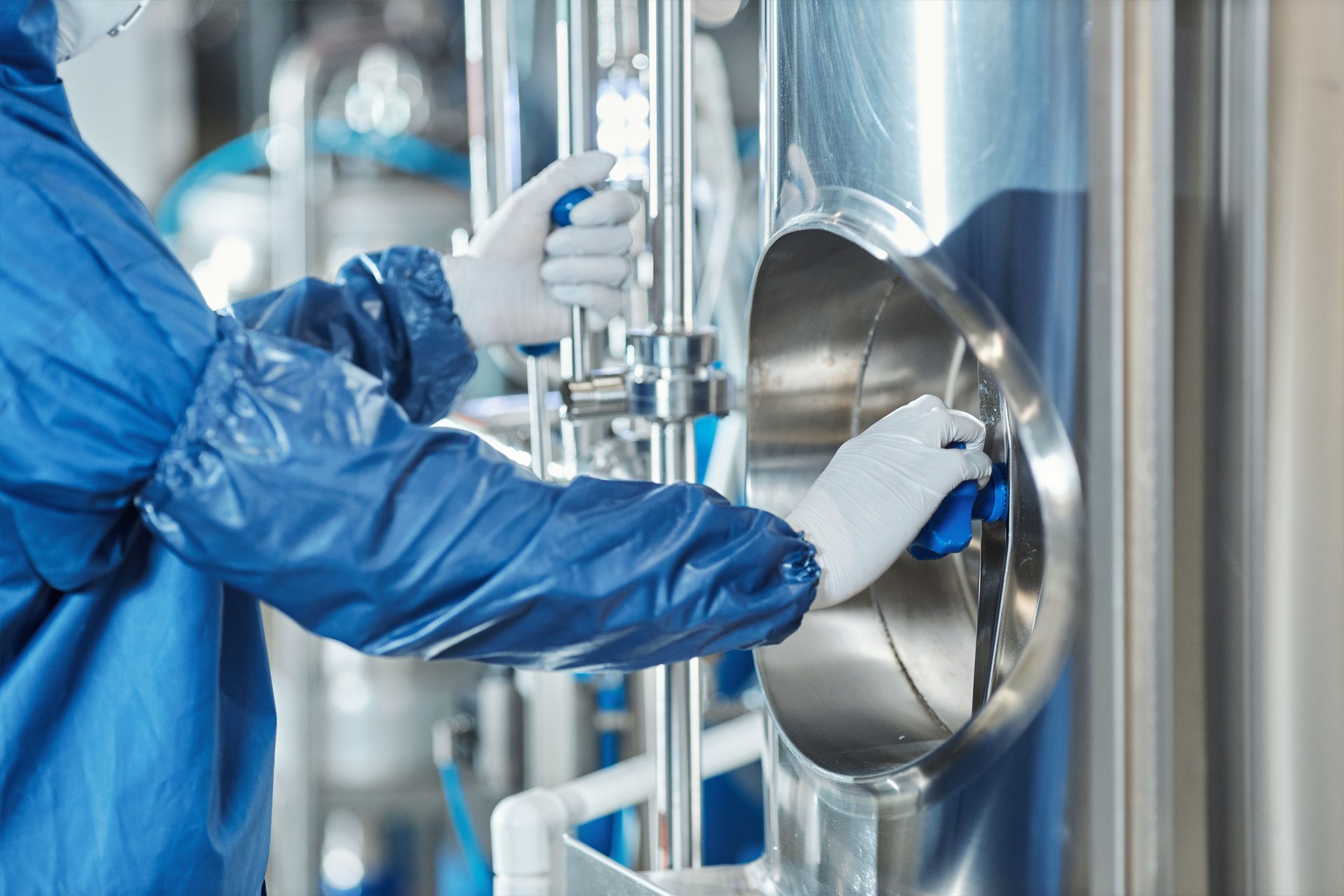 confined space cleaning worker wearing protective gear